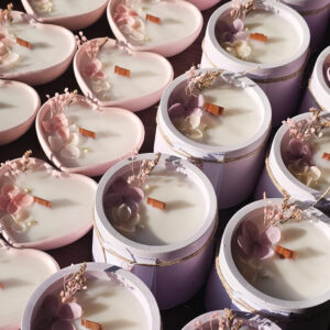 Candele in contenitori